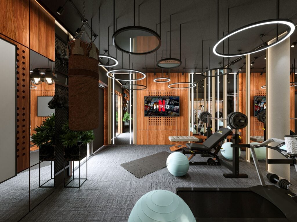 Gym Members Are Spending More Time In Sustainable Training Zones 12 Stylish home gym interior featuring modern fitness equipment and a sleek design for optimal workouts.